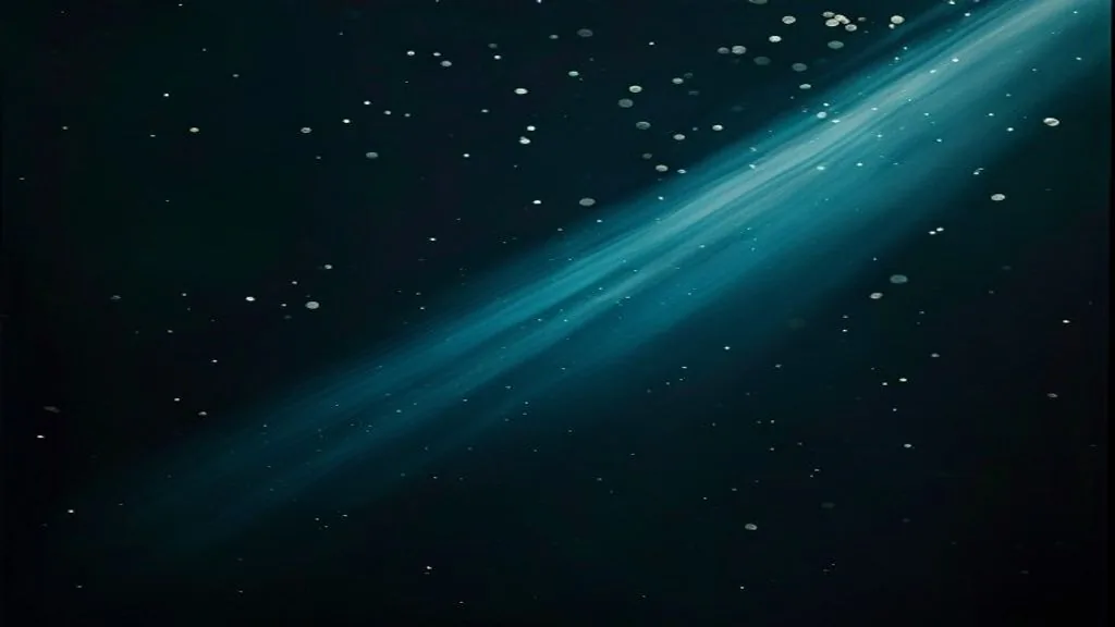 Two thin beams of light converging at a single bright focal point against a dark background